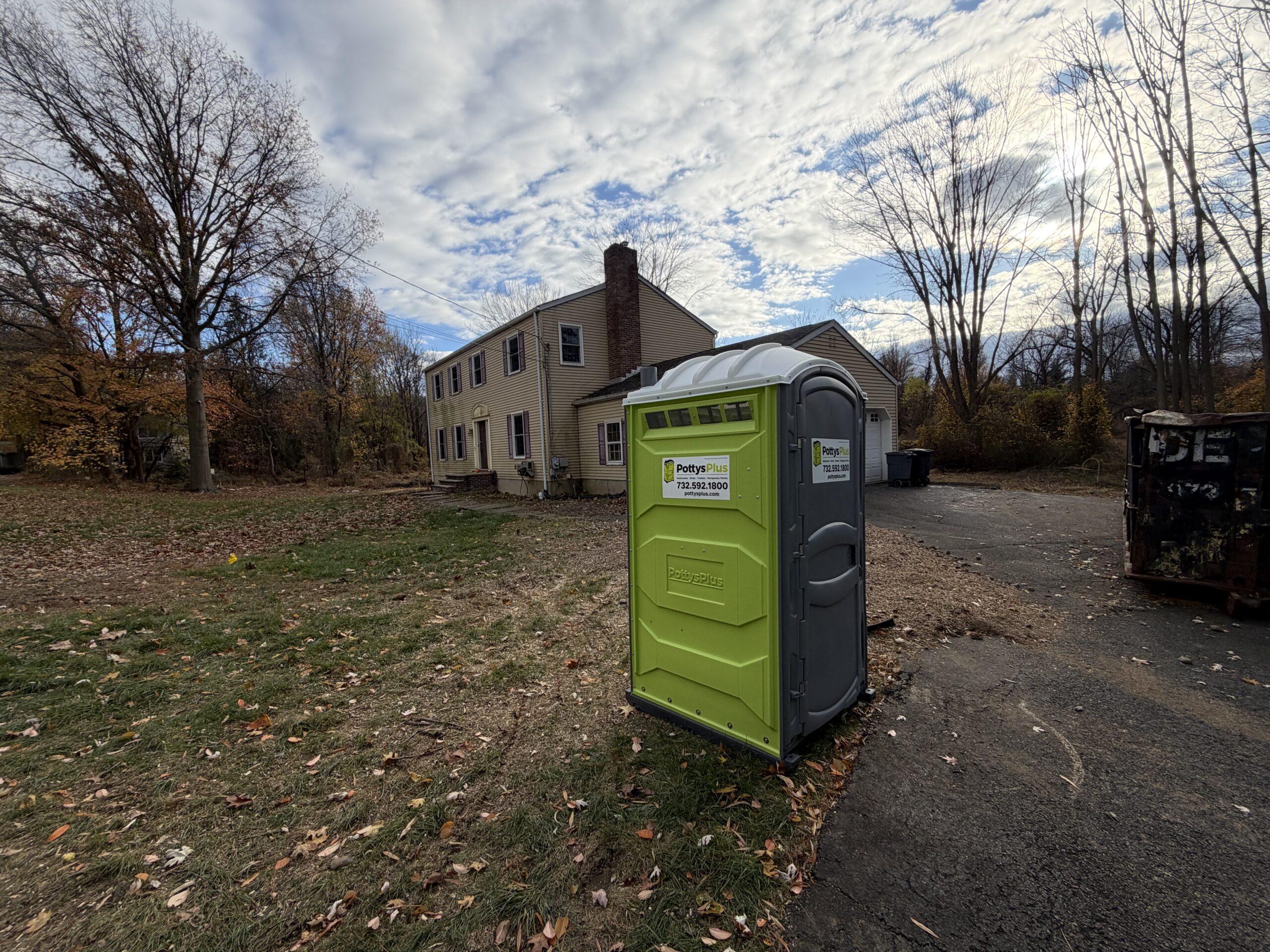 Construction portable toilet rental placed at a commercial site in West Caldwell NJ