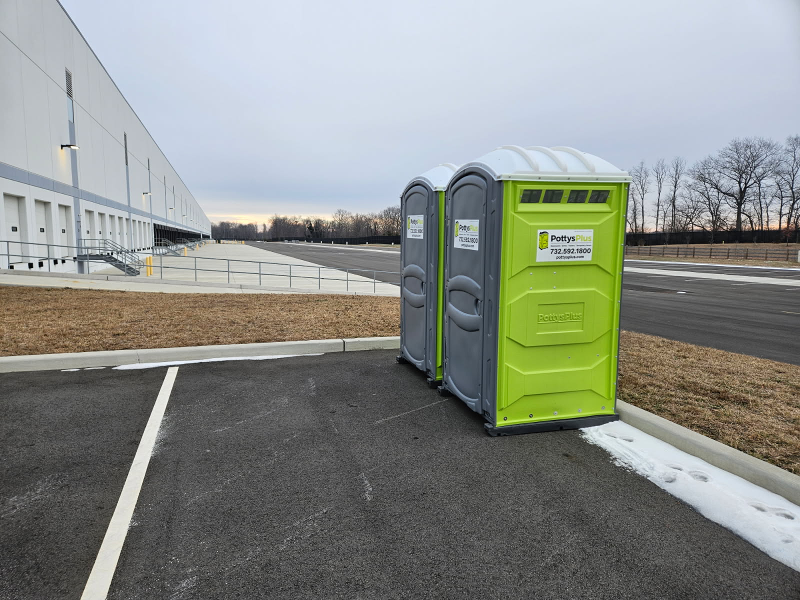 Industrial portable toilet rental at a warehouse loading dock in Fairfield NJ
